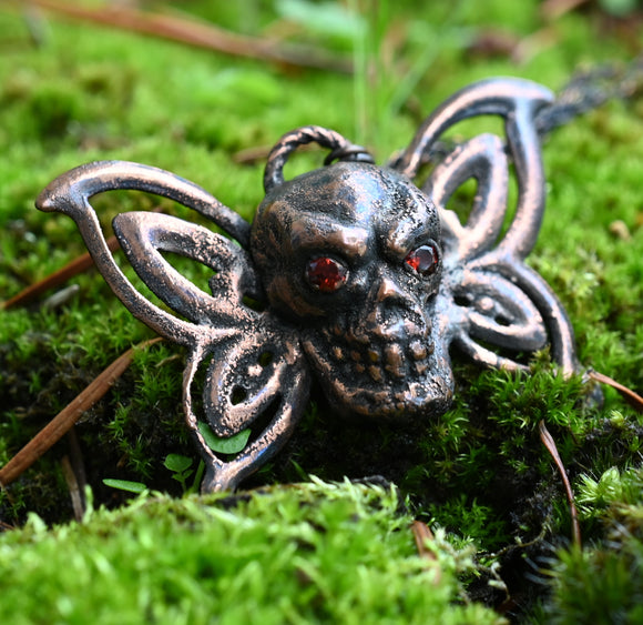 Butterfly Skull with Garnet Eyes Copper Pendant