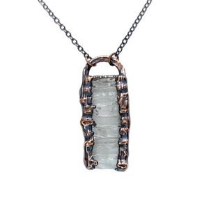 Tiny Elegance Quartz Crystal Pendant