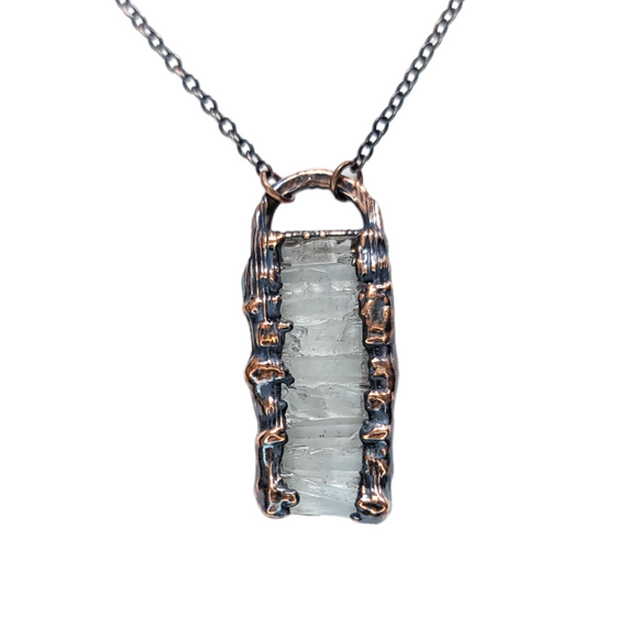 Tiny Elegance Quartz Crystal Pendant