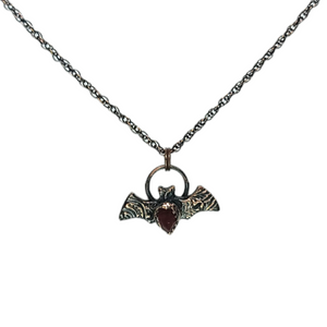 Tiny Copper Embossed Bat Pendant with Faceted Garnet