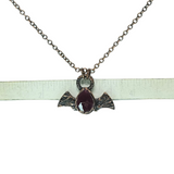 Copper Embossed Bat Pendant with Faceted Garnet