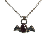 Copper Embossed Bat Pendant with Faceted Garnet
