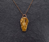 Petrified Wood Coffin Pendant old and weather looking