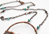 copper chain with turquoise beads on bark pendant with turquoise